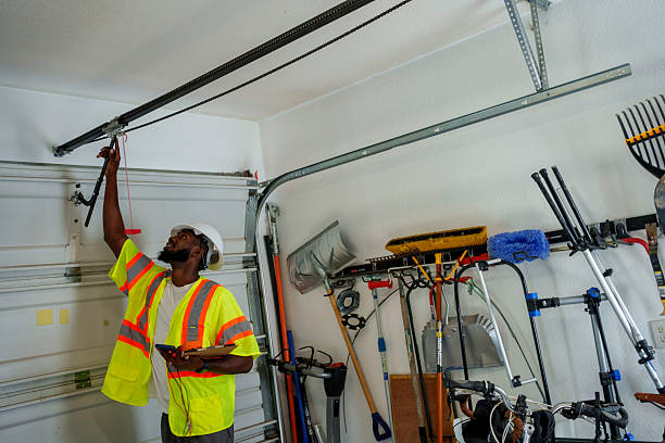 Professional Garage Door Panel Replacement technician working in Medford, MA